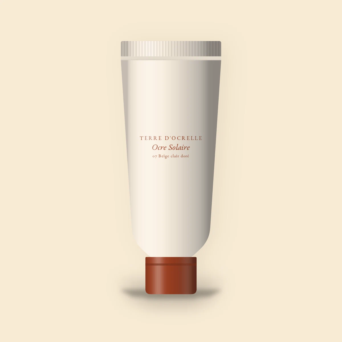 Fond de teint Ocre Solaire à la vitamine E – Terre d'Ocrelle, tube 35 ml, teinte 07 Beige clair doré